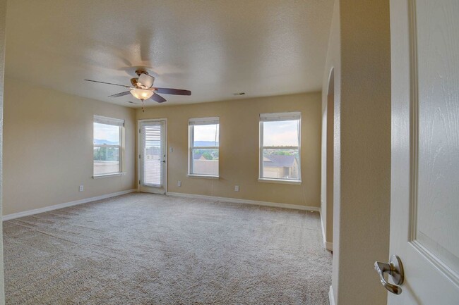 Building Photo - Updated Townhome Near Fort Carson with Unm...