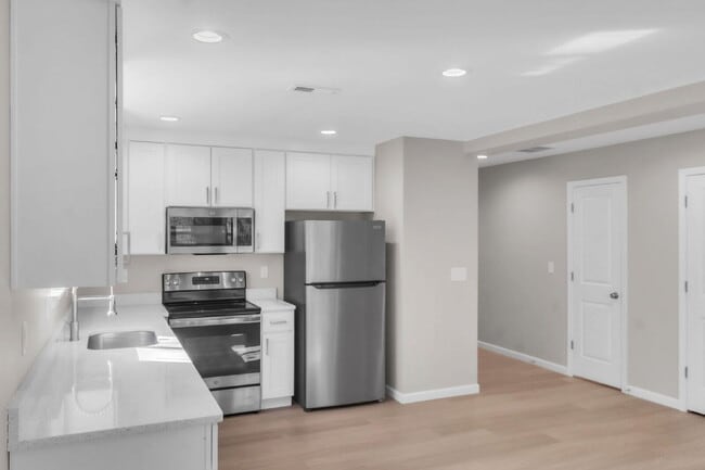 Building Photo - Elegant 3 Bedroom, 2.5 Bathroom Duplex with 1-Car Garage in Woodruff $1695/mo rent