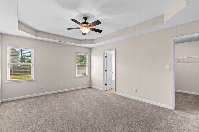 Building Photo - Spacious Home with Natural Light