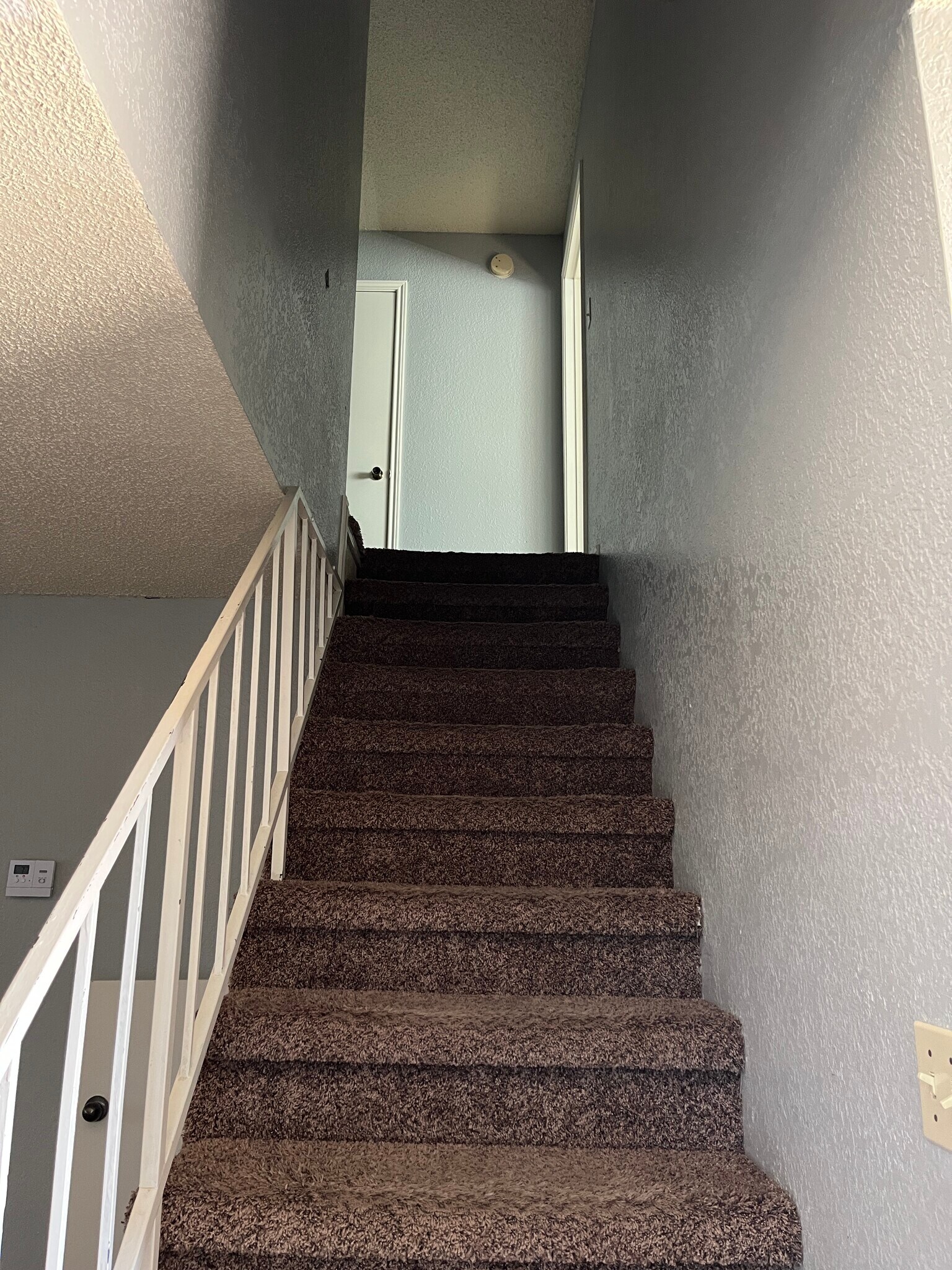 Stairway to second floor - 926 Chisholm Cv