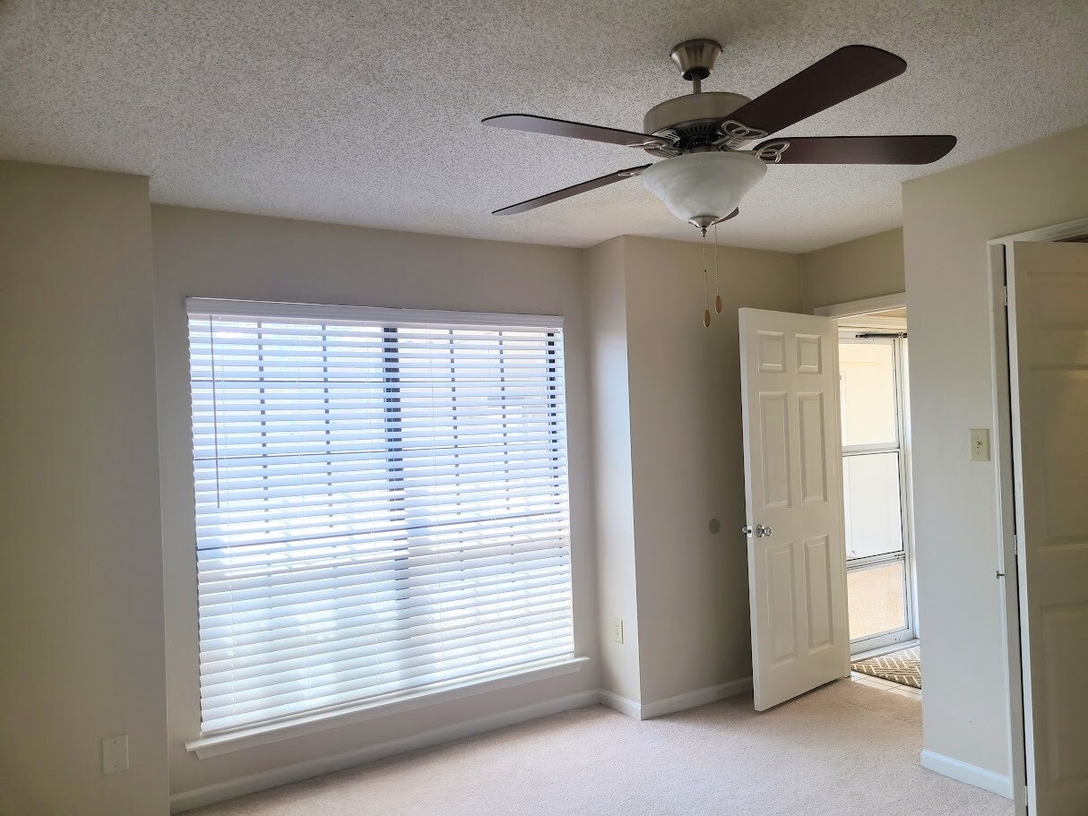 Guest Bedroom #2 also with a large window overlooking private patio - 12439 Coursey Blvd
