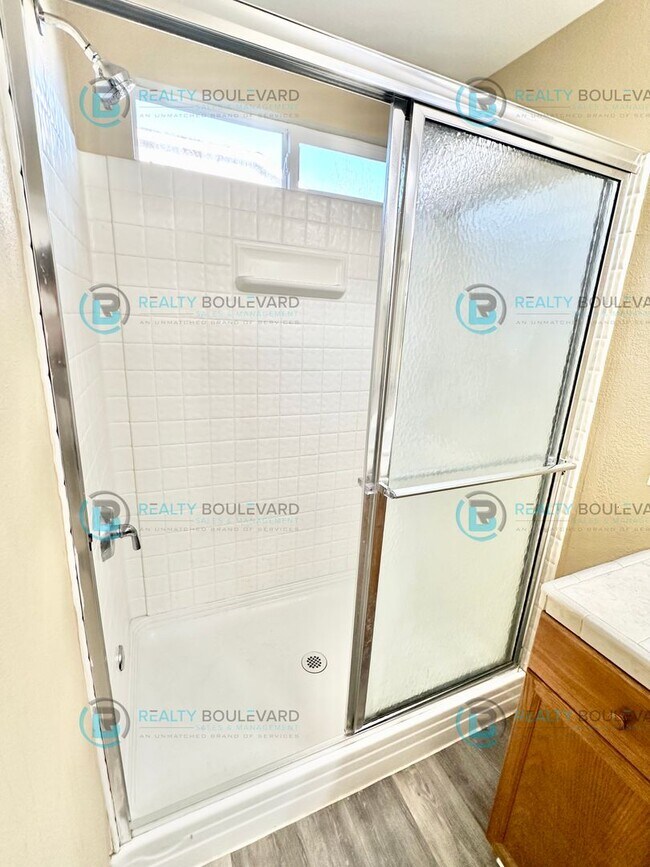 Building Photo - Open Layout, Big Yard, Great Location—This One Has It All!