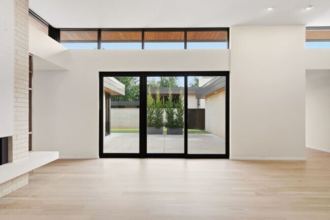 Building Photo - Experience contemporary luxury in this exceptional custom-built Midtown Tulsa residence, where so...