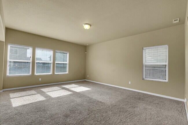 Building Photo - $2,490.95 - 4 Bed, 2.5 Bath Home in CO Springs with Fenced in Yard and 3 Car Garage!