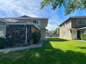 Building Photo - <b>Beautiful Two Story Condo near Meadowoo...