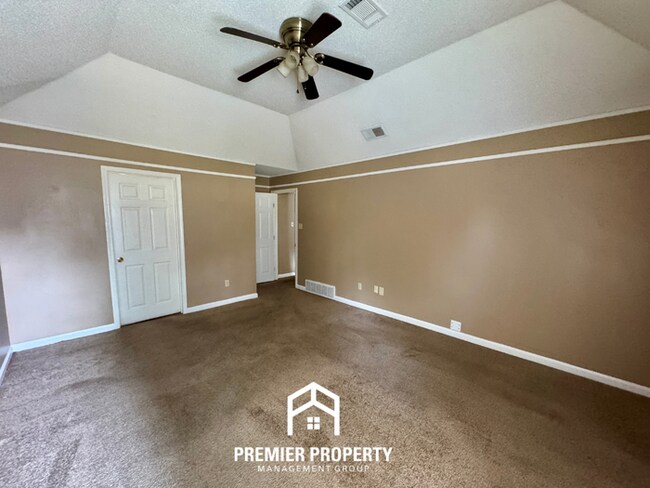 Building Photo - Spacious 3BR/2BA Near Southwind | 1,958 Sq Ft, Brick Fireplace, 2-Car Garage & Quiet Cove