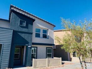 Building Photo - AMIGO TRAILS - BRAND NEW TOWNHOME