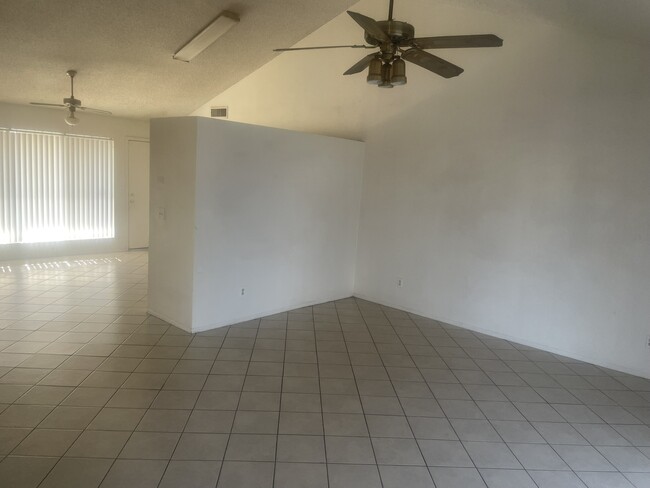 Building Photo - Four Bedroom Two Bath Vaulted Ceilings