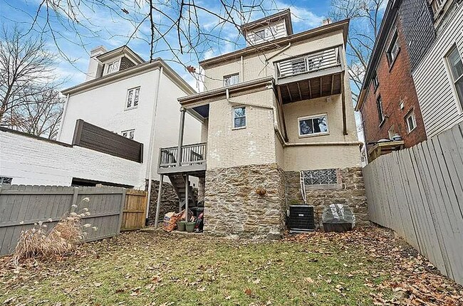 Shared back yard with private porch - 1043 S Trenton Ave