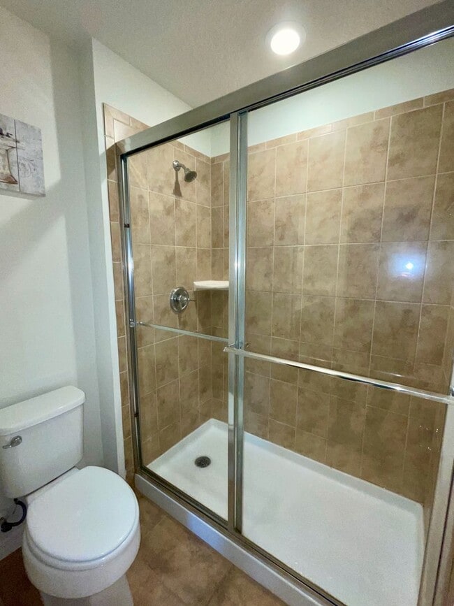 Building Photo - Spacious 5-Bed / 4.5-Bath Townhome w/ Private Pool & Sundeck in Gated Oakmont at Solterra Near Di...