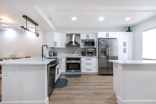 Building Photo - 6096 Huntwick Terrace