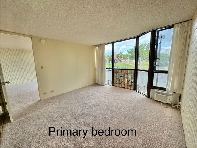 Building Photo - Charming 2 bed, 2 bath, with 1 secured covered parking stall and In-Unit Washer/Dryer. Available Now