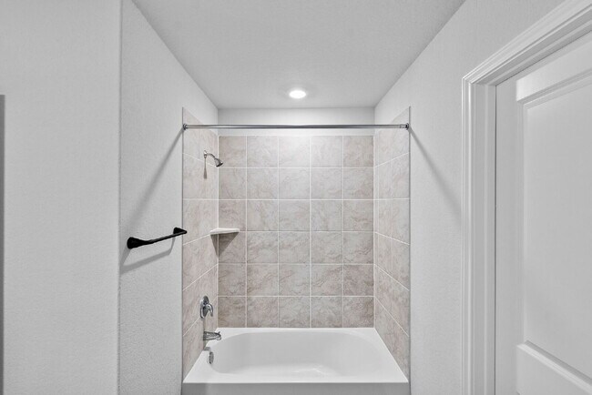 Building Photo - RESORT STYLE AMENITIES!! Multiple Pools. Lazy River. Splash Pad and Water Slides. Fitness Center....