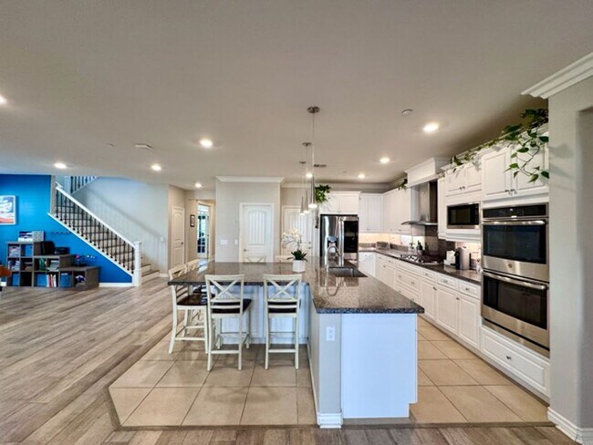 Building Photo - Stunning 5 Bedroom + Office Home with Priv...