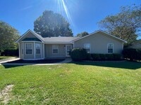 Building Photo - 213 Dahlia Dr