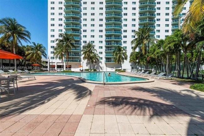 Building Photo - 19380 Collins Ave