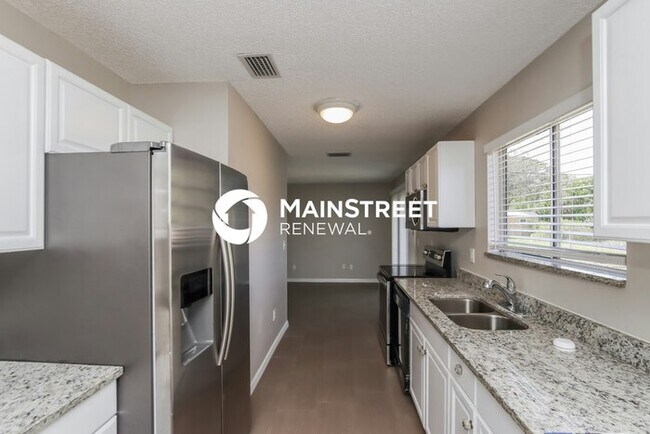 Building Photo - 3 Bedroom Pet-Friendly Home in PALM BAY, FL with Main Street Renewal