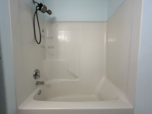 Building Photo - Inviting Two-Story 3BR Home Featuring New Carpet, New Stainless Appliances, Spacious Garage Stora...