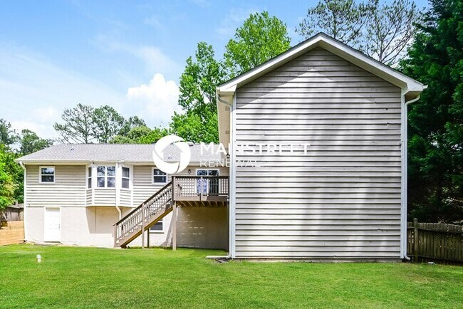 Building Photo - 5 Bedroom Pet-Friendly Home in JONESBORO, GA with Main Street Renewal