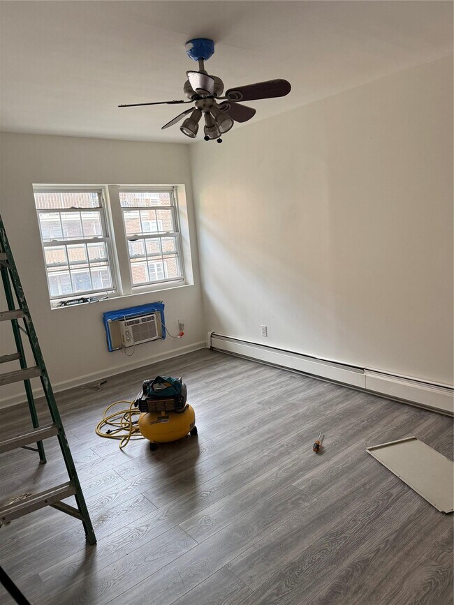Building Photo - 47-57 58th Ln