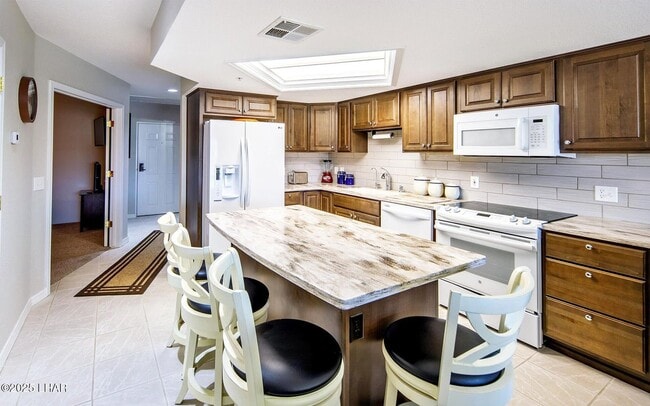 Building Photo - Long Term Furnished Condo