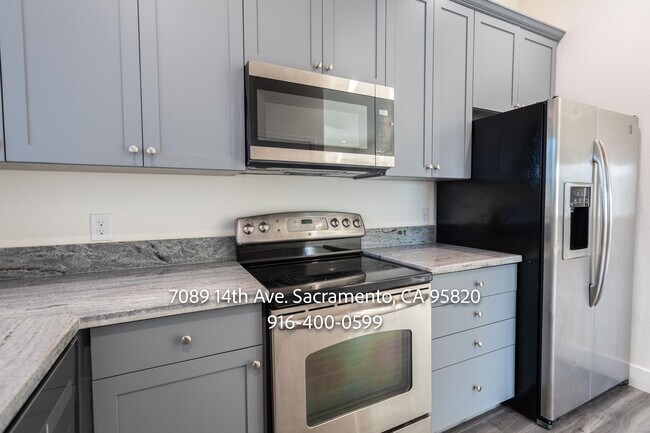 Building Photo - 7089 14th Ave