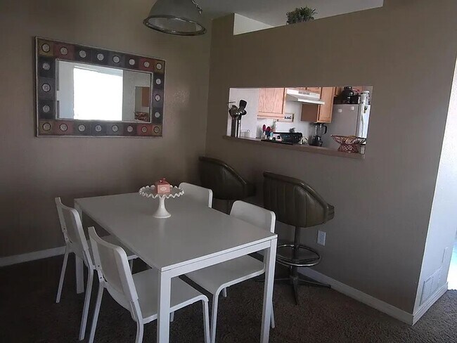 Building Photo - Charming Fort Collins Townhome with Private Patio, Vaulted Ceilings & Prime Location!