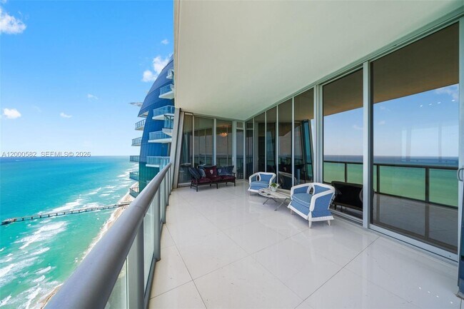 Building Photo - 17121 Collins Ave