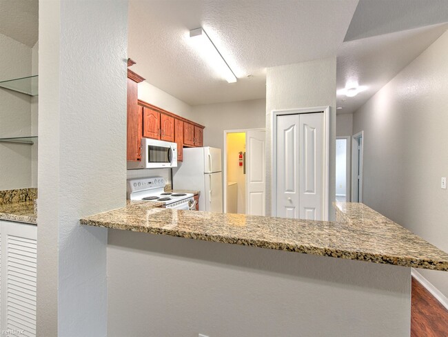 Building Photo - 2 br, 1 bath Condo - 5703 Legacy Crescent ...