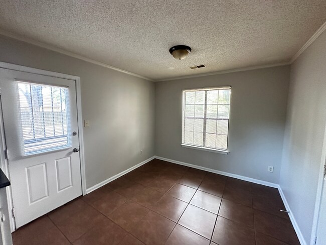 Building Photo - MOVE-IN READY! 3BR/2BA in Quiet Cove | Brick Fireplace | Fenced Yard & Patio!