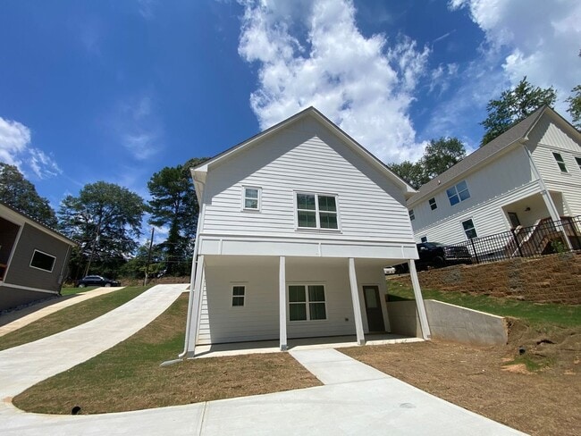 Building Photo - NEW CONSTRUCTION 5 BEDROOM PRE-LEASING FOR...