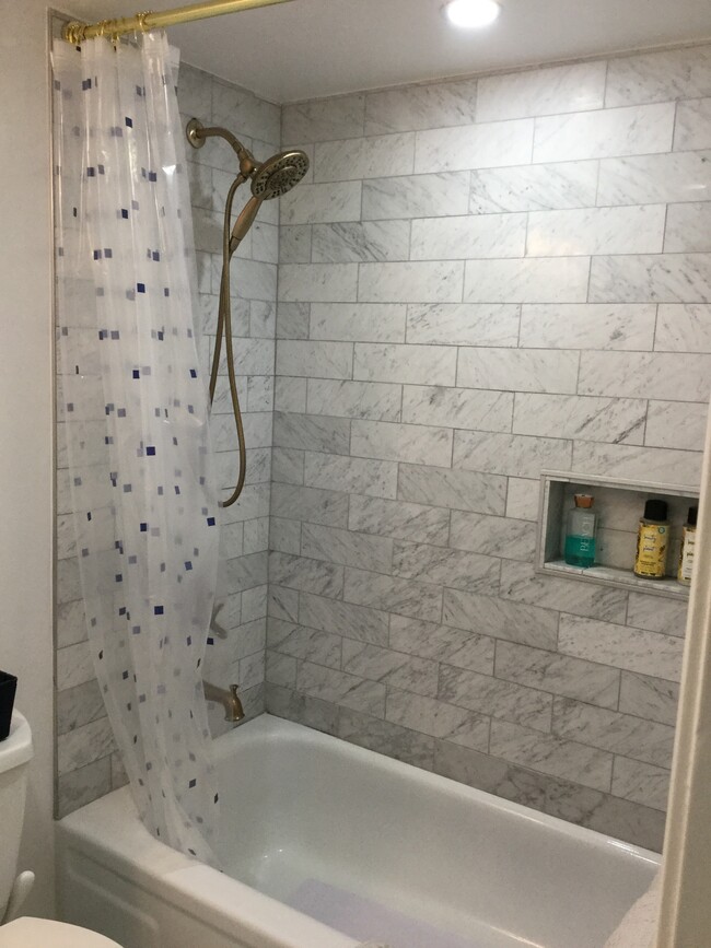 Guest bath-new tile - 1541 S Ocean Blvd