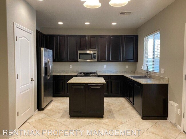 Building Photo - 4 br, 2.5 bath House - 688 CALAMUS PALMS PL