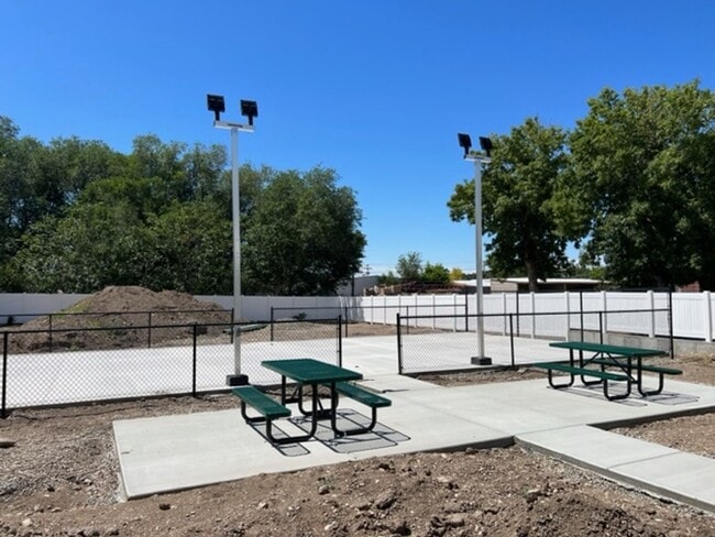 Building Photo - Half off the first months rent - Beautiful home with pickle ball court, 2 car garage and central air