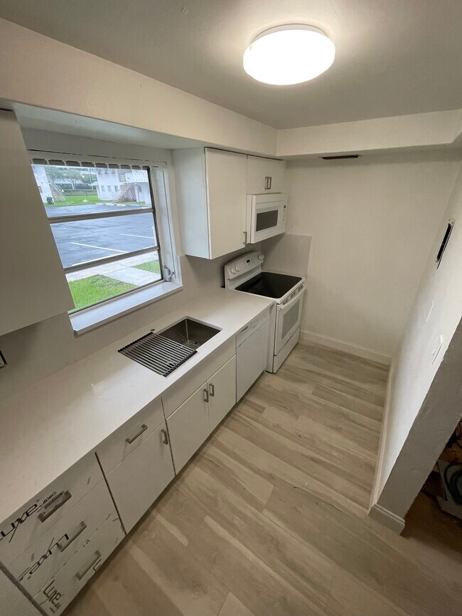 New cabinets, dishwasher and micro hood - 7426 SW 82nd St