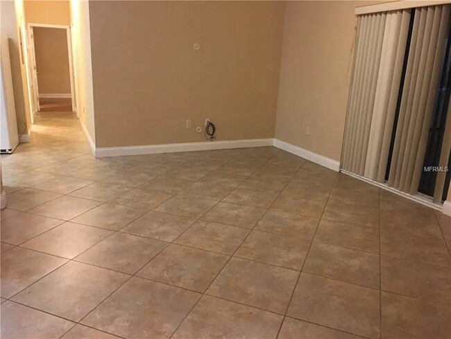 Living room and hallway to rooms - 5811 La Costa Dr