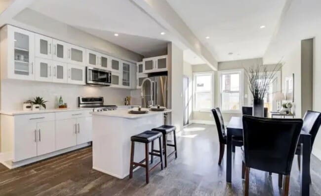 Building Photo - “Elegant 3-Story Home Showcasing High-End Renovation, Gourmet Kitchen, and Private Deck for Moder...