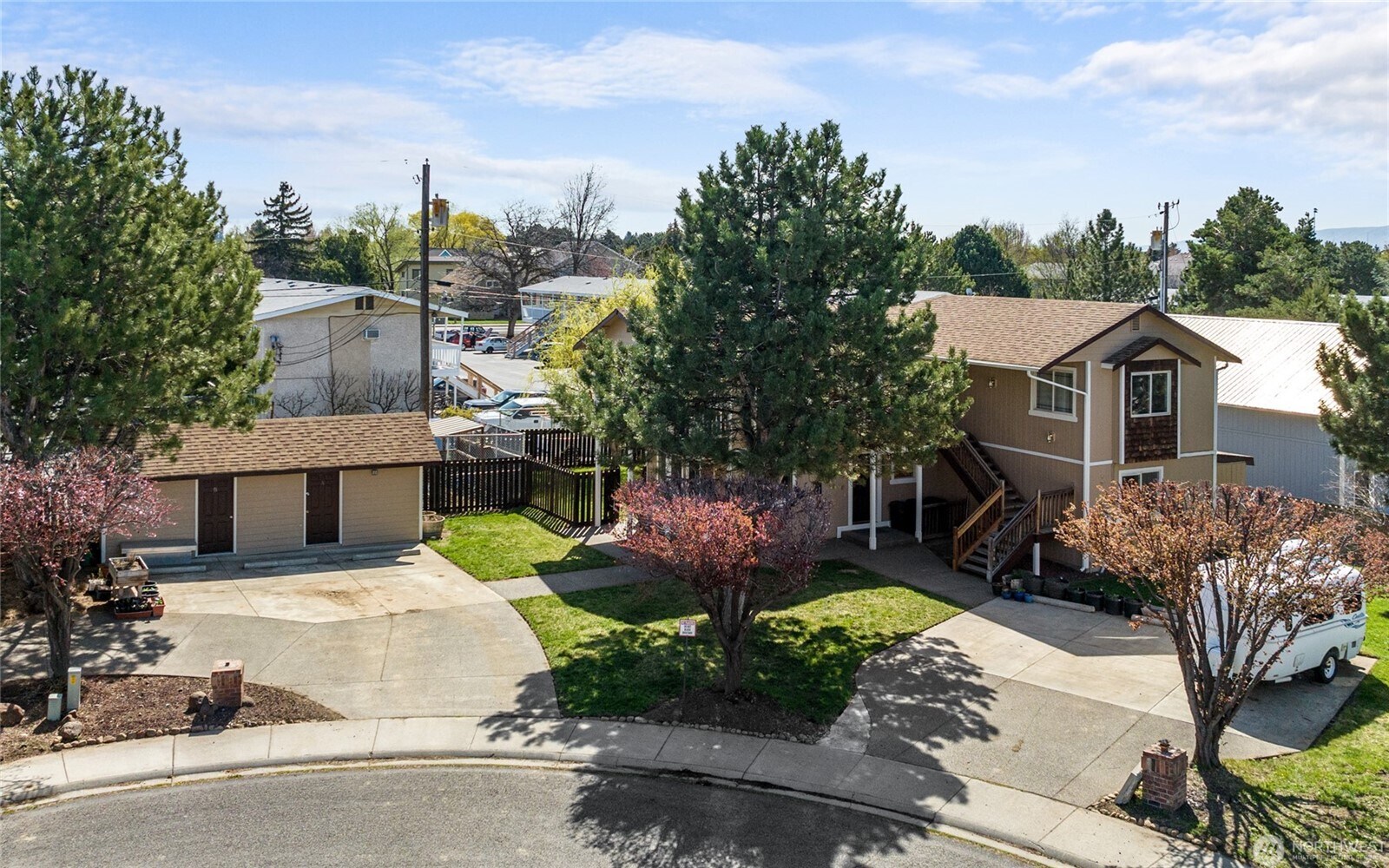 Apartment and parking at right, storage at left - 502 E River Ave
