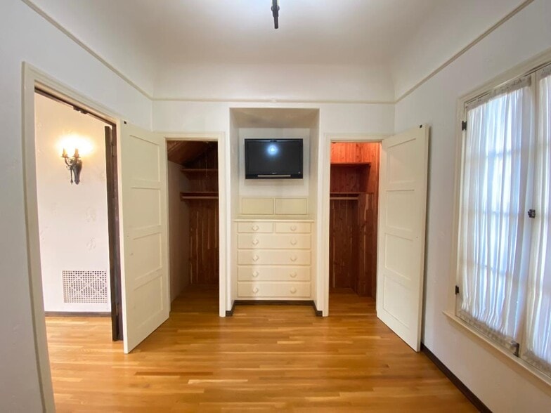 BEDROOM CLOSET DOORS OPEN - 1841 Kelton Ave