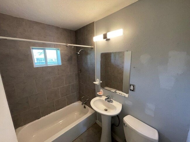 Building Photo - 2 bed garage conversion adding a flex room, full size washer connections.