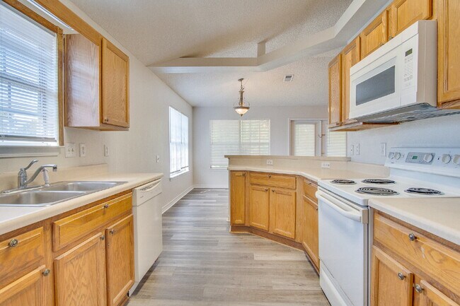 Building Photo - Lakefront Living in Gulf Breeze – Spacious...