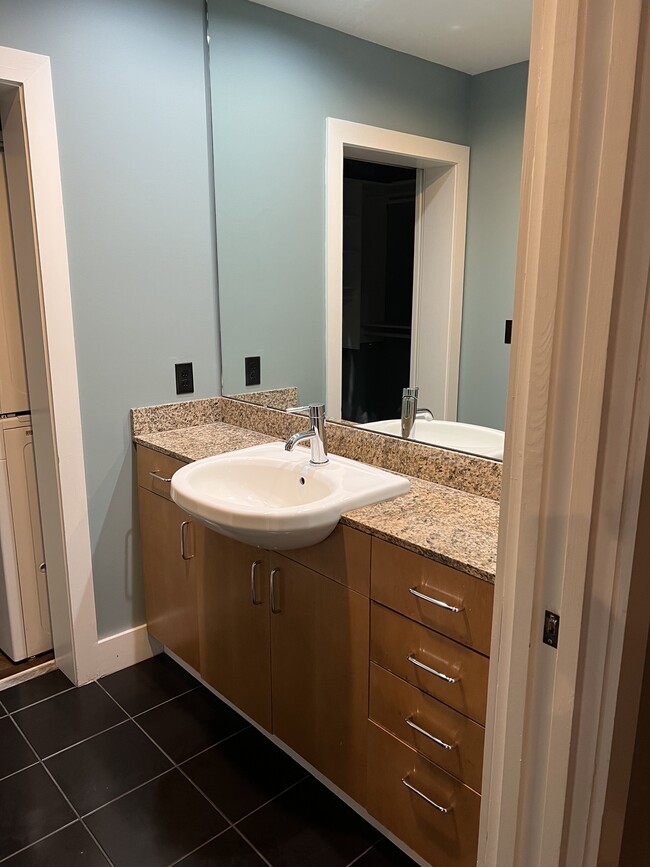 Bathroom vanity area - 505 6th E St