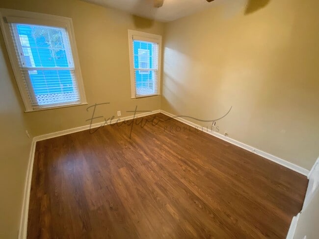 Building Photo - Well-Kept 3BR Home with Sunroom, Garage & Fenced Yard