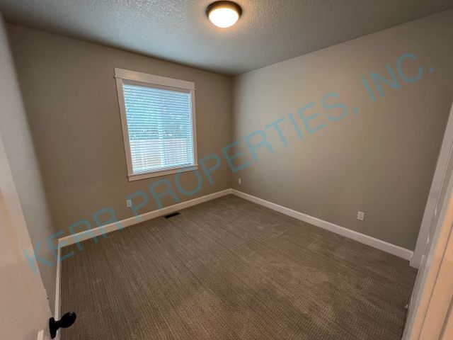 Building Photo - Charming 4-Bedroom Home with 2 Full Baths ...