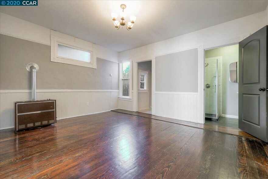 Living room (entry to kitchen, bathroom) - 694 25th St