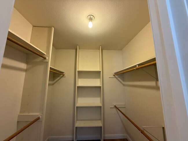 Building Photo - Stunning three-story home located in the c...