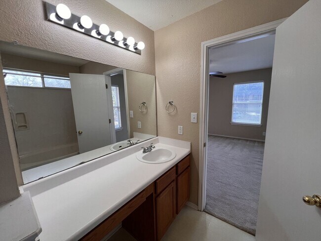 Building Photo - Generous Outdoor Space & Lawn Care Included!