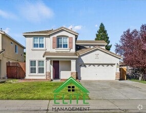 Building Photo - **Spacious 4-Bedroom, 2.5-Bath Home with L...