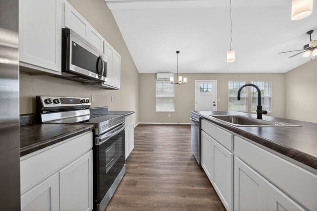 Building Photo - BRAND-NEW 4BR/2BA Duplex/Patio home with Garage - Available Now near Hollister, Schools