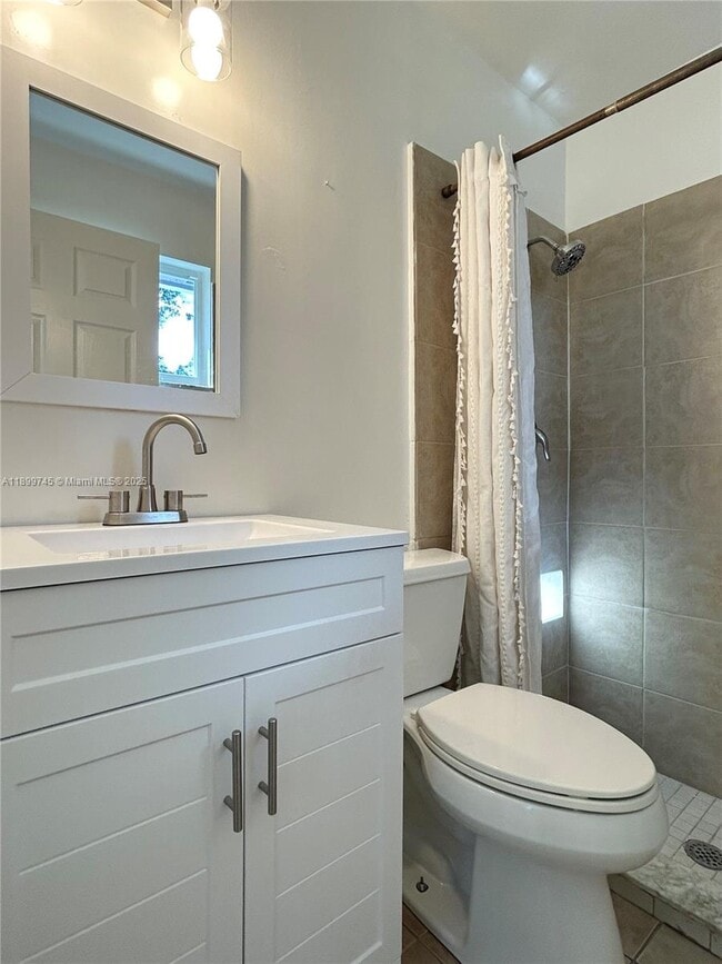 Building Photo - 6452 Royal Palm Beach Blvd